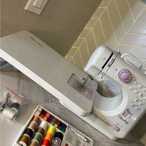 White and Purple Sewing Machine